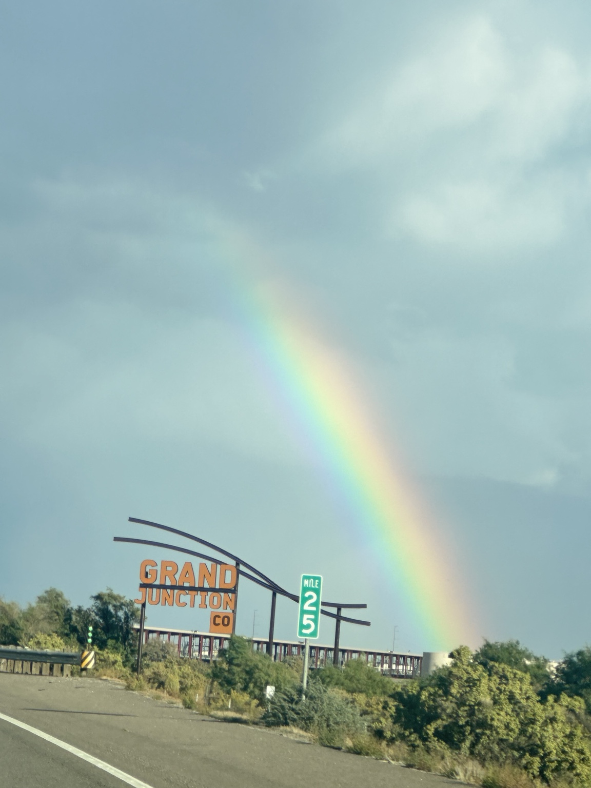 Rainbow over the Grand Junction, Colorado welcome sign